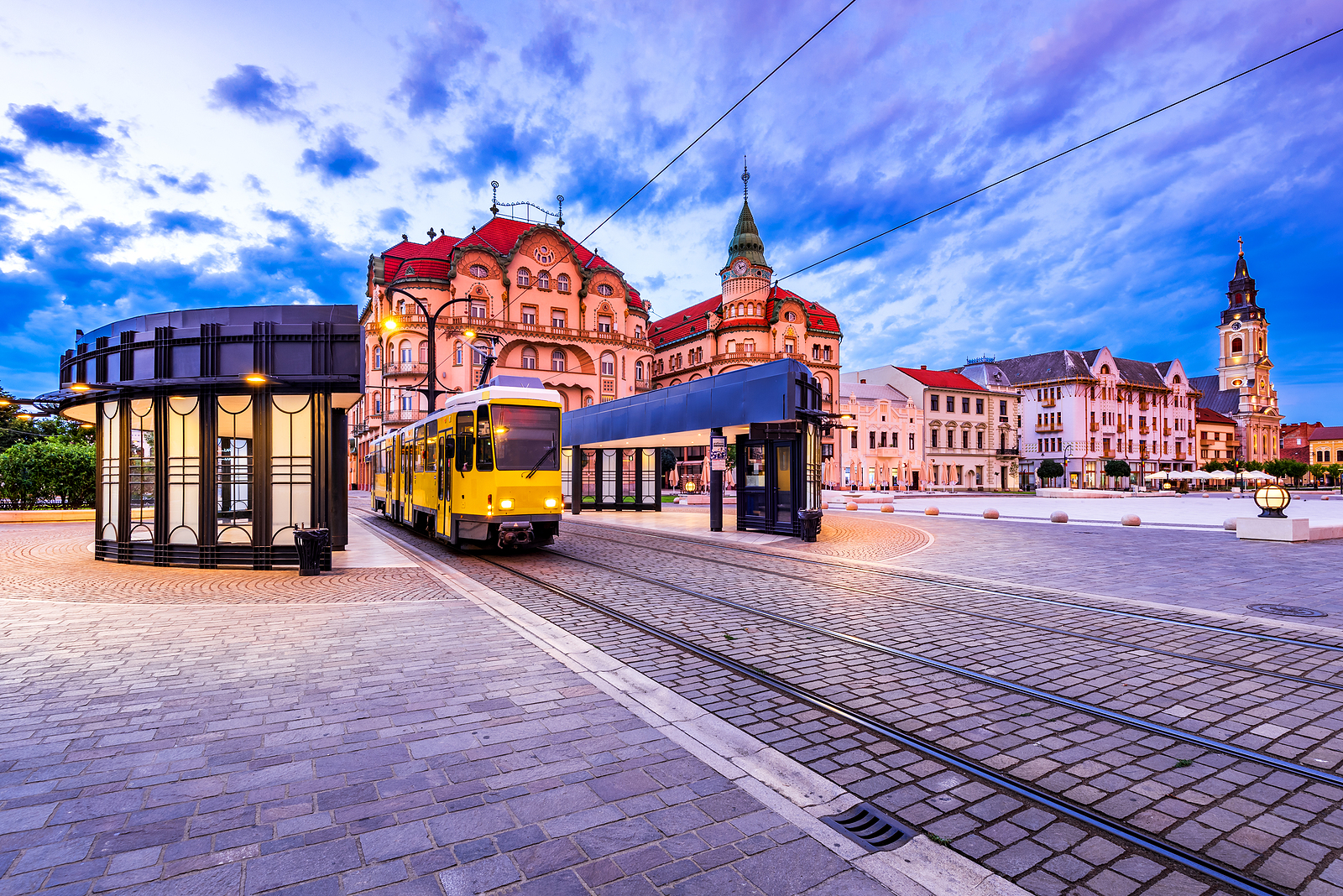 Oradea, Transylvania With Tram Station In Union Square Cityscape